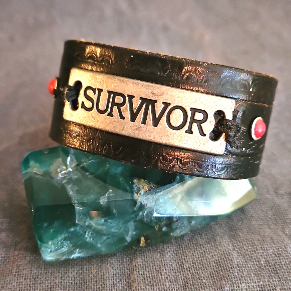 Black tooled leather cuff bracelet SURVIVOR rivets vintage 7.75" wrist ooak nwt